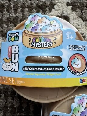 Rainbow Mystery Dumpling Squishy UV colors